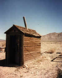 Old Outhouse Used at the Standard Gas Station in the 1930s and 40s-Women's Entrance in Front-Men's in Back.jpg (67469 bytes)